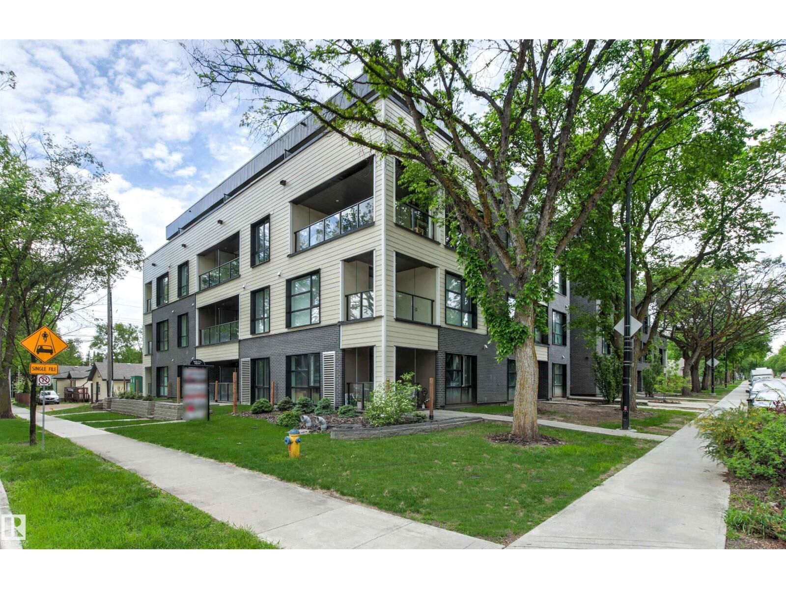 Property Photo:  #413 11503 76 Av NW  AB T6G 0K6 