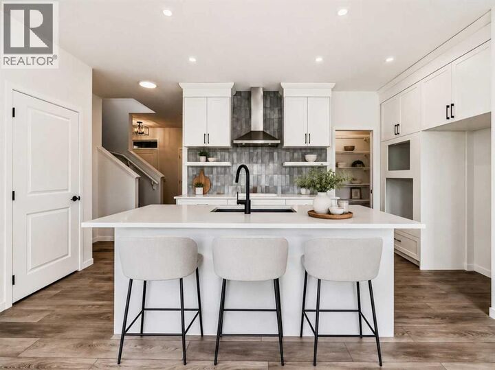Property Photo:  310 Montrose Crescent Southeast  AB T1V 0L1 