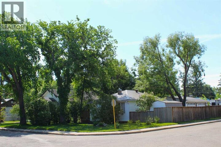 Property Photo: 31 Spruce Avenue West AB T1R 0A2