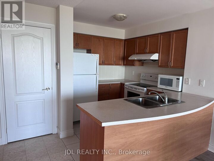 Property Photo: 60 Brian Harrison Way 1909 ON M1P 5J5