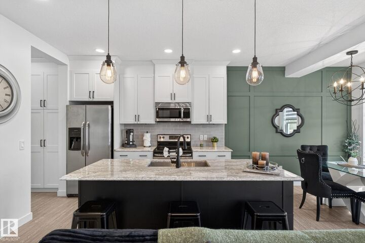 Property Photo: 8612 Cushing Place SW AB T6W 3R4
