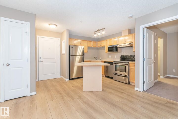 Property Photo: 245 Edwards Drive SW 119 AB T6X 1J9