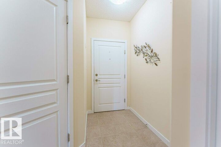 Property Photo: 5 Gate Avenue 210 AB T8N 0N3