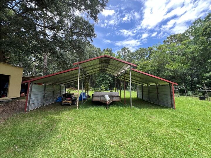 Property Photo:  5202 Burma Road W  AL 36693 