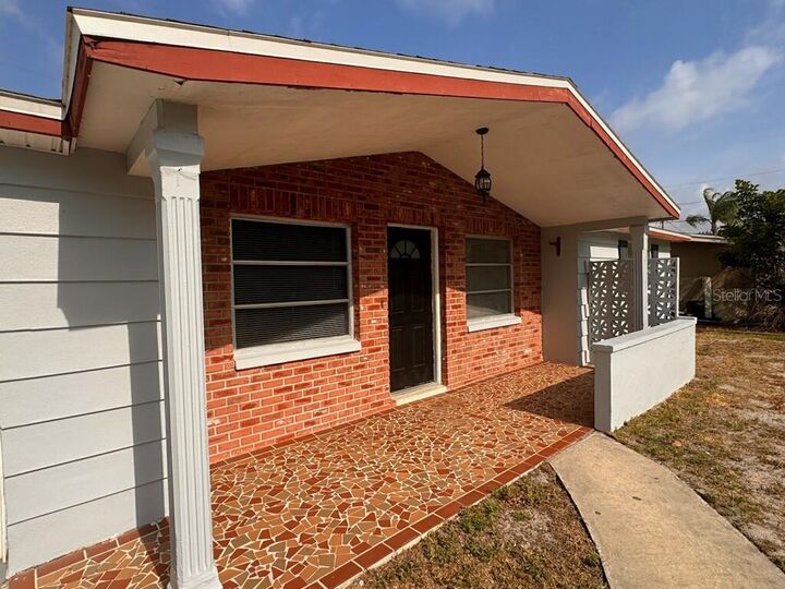 Property Photo:  10731 Premier Avenue  FL 34668 