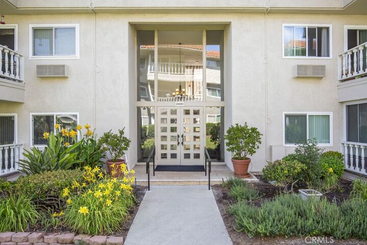 Property Photo: 2400 Via Mariposa 1A CA 92637
