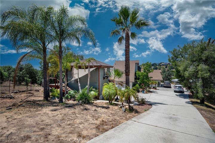 Property Photo:  1832 Camino Rainbow  CA 92028 