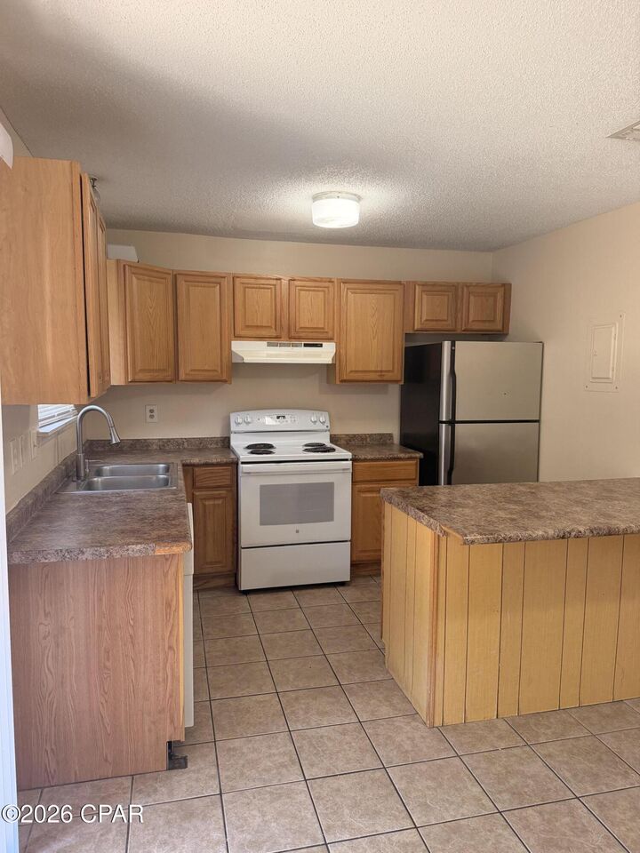Property Photo:  2750 W 12th Street 1C  FL 32401 