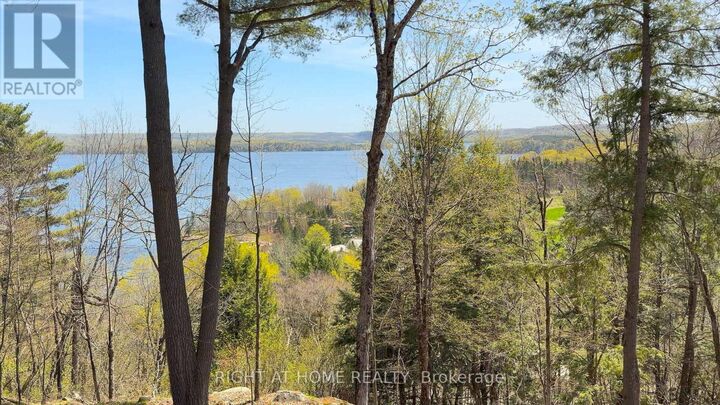Property Photo: 13 Tree Tops Lane 202 ON P1H 1B3