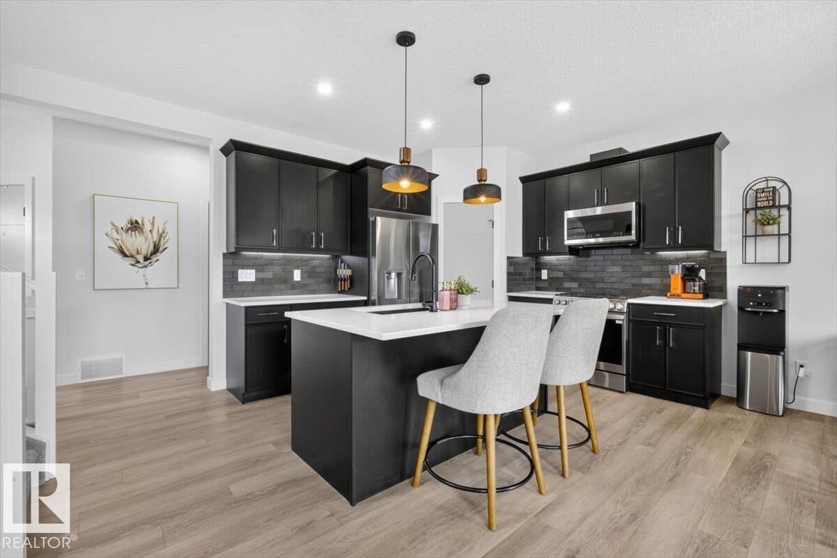 Property Photo:  24 Maple Crescent  AB T0A 1N0 