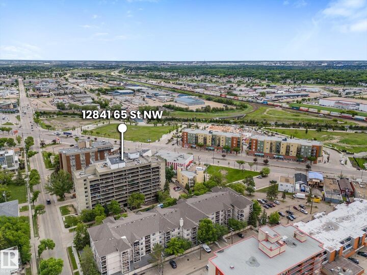 Property Photo:  12841 65 Street NW 211  AB T5N 4N4 