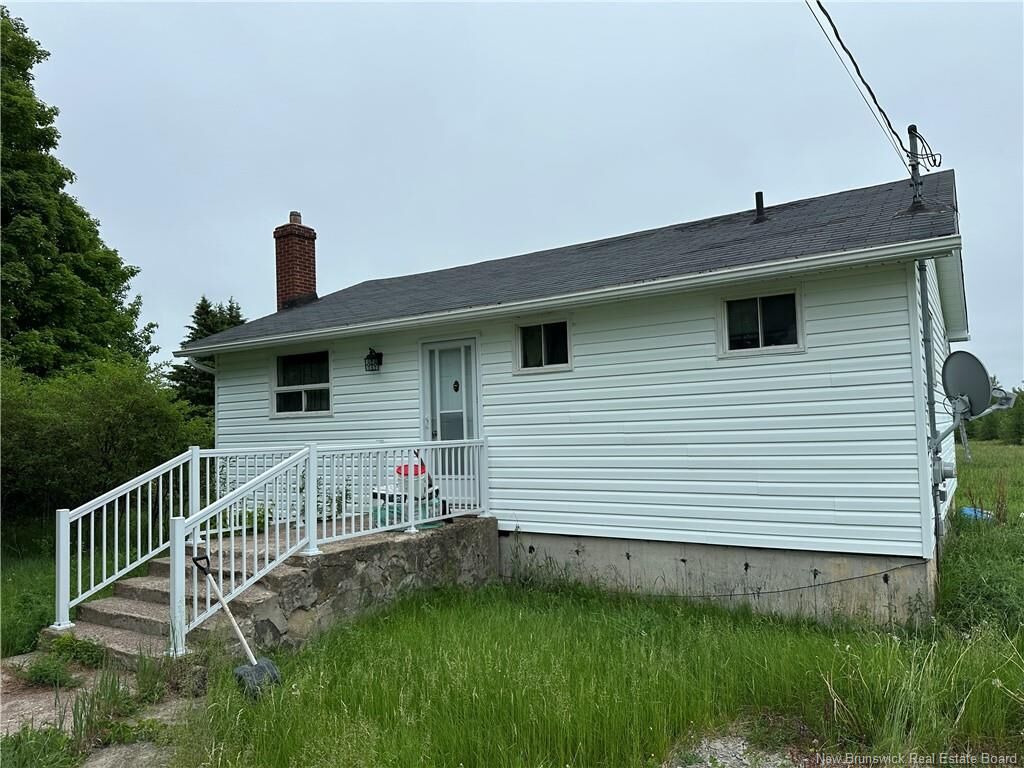 Property Photo: 709 Saint-Charles NB E4W 4Z6