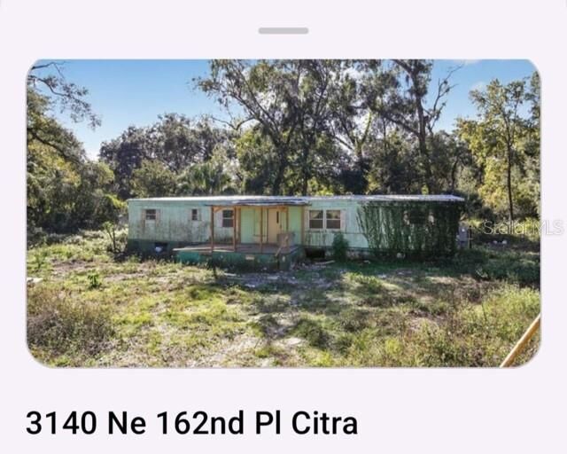 Property Photo:  3140 NE 162nd Place  FL 32113 