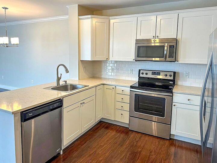 Property Photo:  978 Worcester 403  MA 02482 