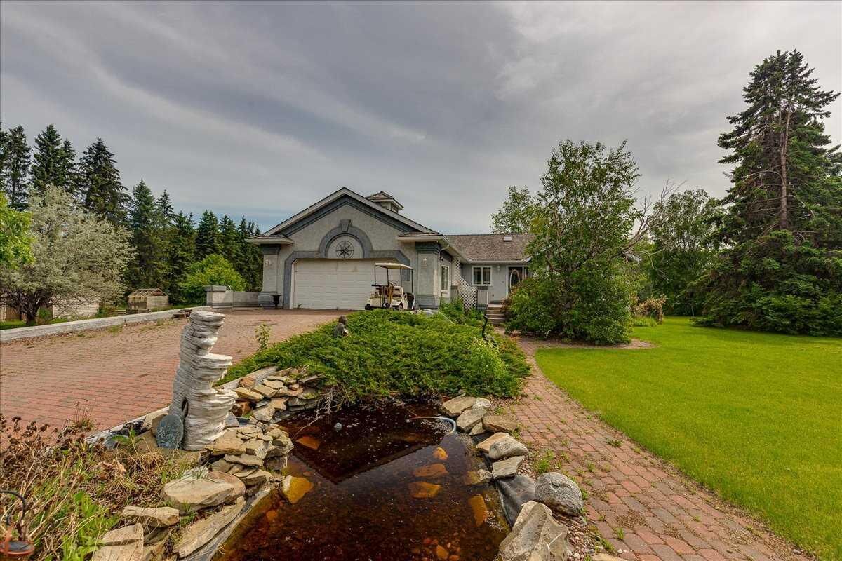 Property Photo: 29104 Highway 27 AB T4H 1P2