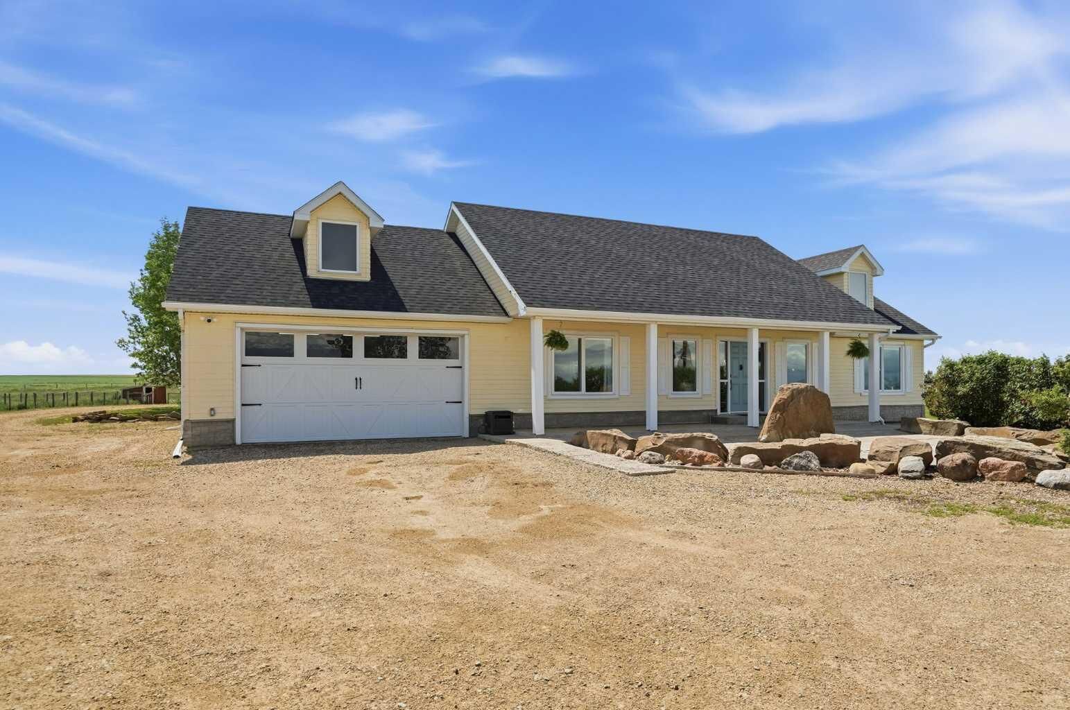 Property Photo: 245169 271 Range Road AB T1Z 0V9