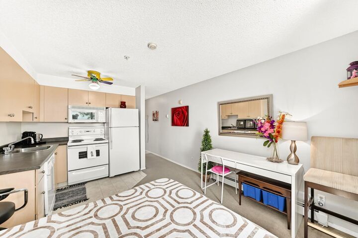 Property Photo:  1620 70 Street SE 4310  AB T2A 7Z2 