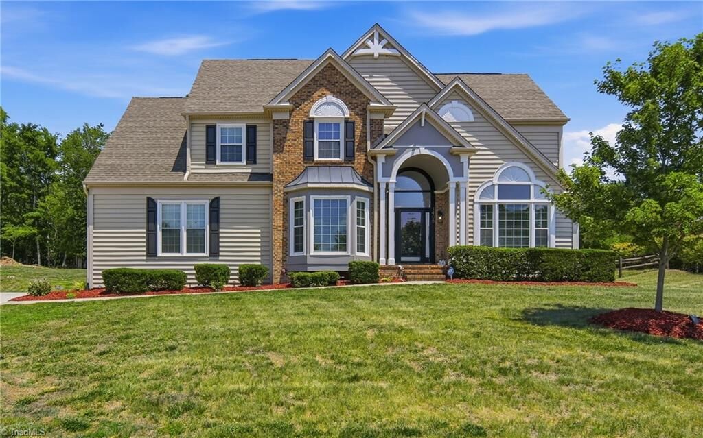 Property Photo:  1406 Spring Tree Court  NC 27265 