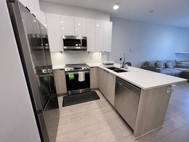 Property Photo:  20360 Logan Avenue 616  BC V3A 0P5 