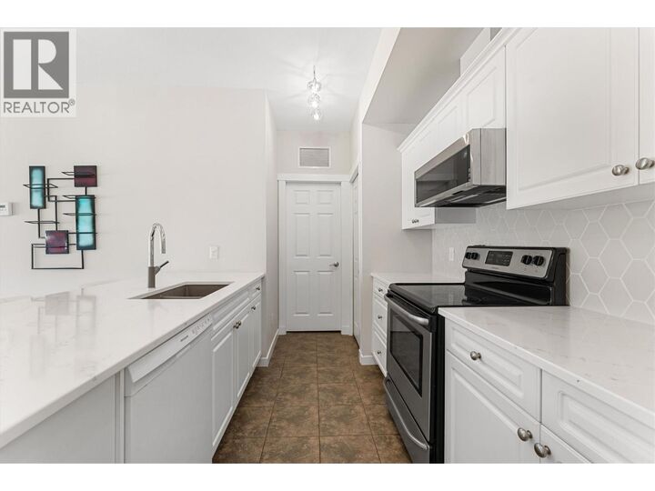 Property Photo: 3550 Woodsdale Road 303 BC V4V 1Y9