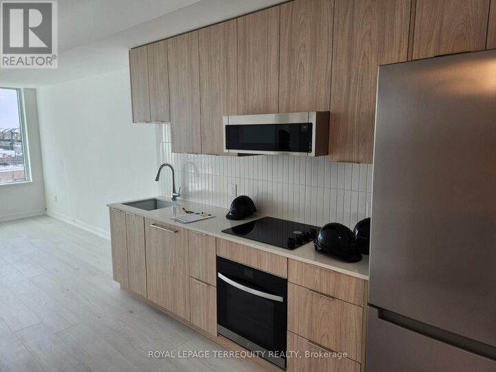 Property Photo:  2501 Saw Whet Boulevard 313  ON L6M 5N2 