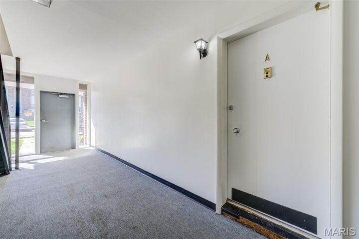 Property Photo:  7727 Hazelcrest Drive A  MO 63042 