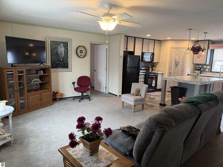 Property Photo:  1042 Jackson Court  MI 48858 