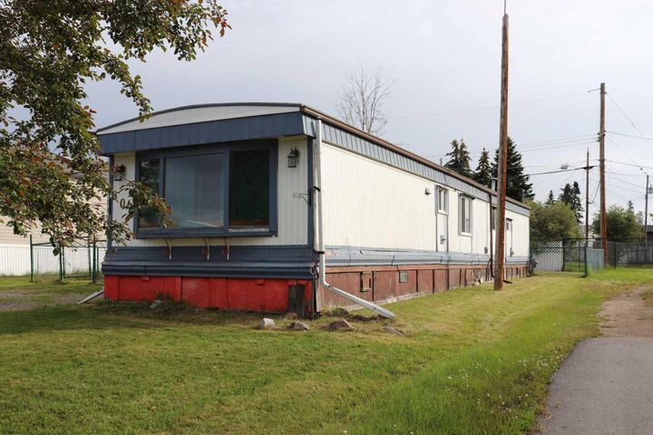 Property Photo: 809 52 Street AB T7E 1K4