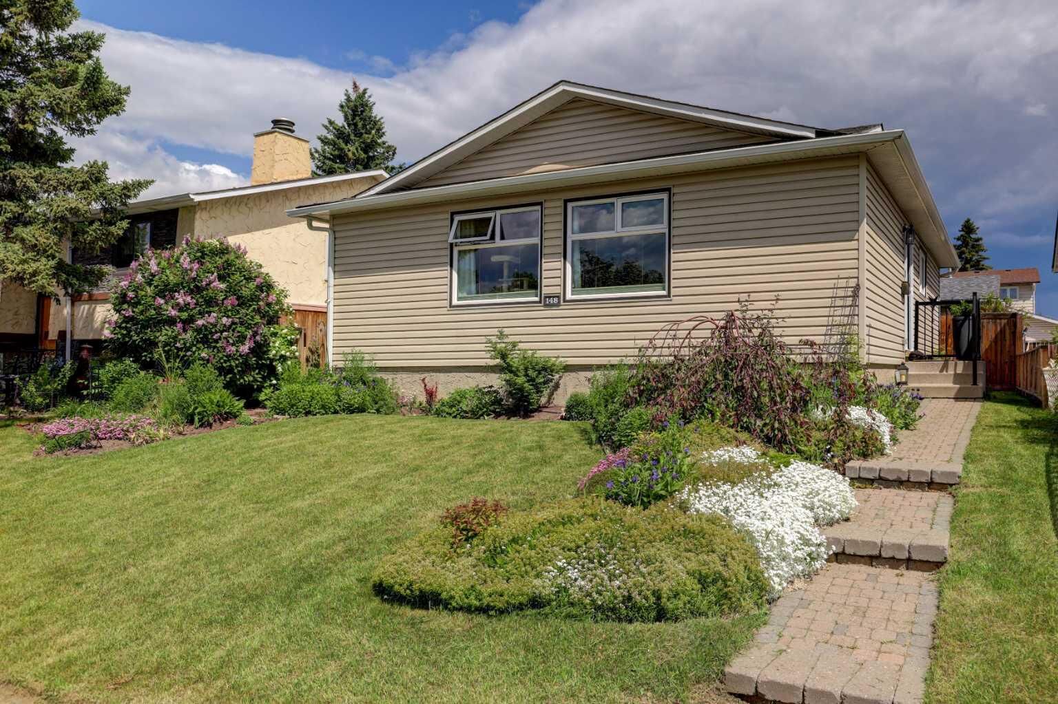 Property Photo: 148 Rundlecairn Rise NE AB T1Y 2Y3