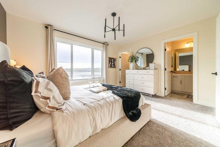 Property Photo: 160 Snowberry Common SE AB T3M 4G7