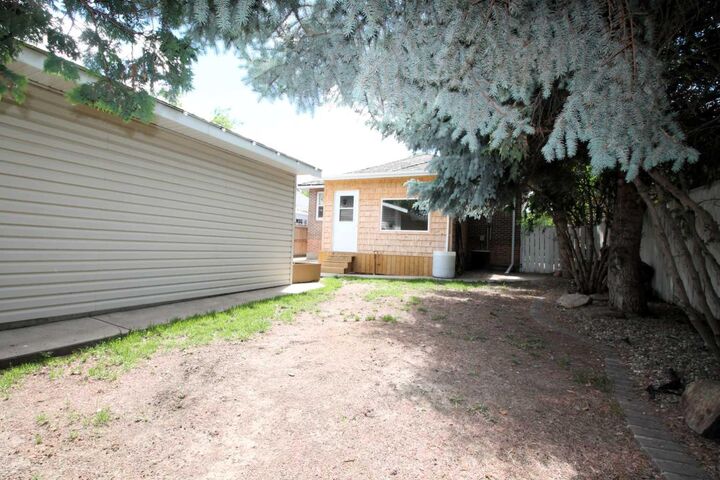 Property Photo: 819 9 Avenue S AB T1J 1T6