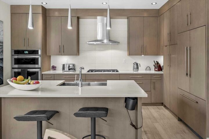 Property Photo: 101A Stewart Creek Rise 101 AB T1W 0K2