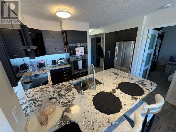 Property Photo: 120 Dallimore Circle 326 ON M3C 4J1