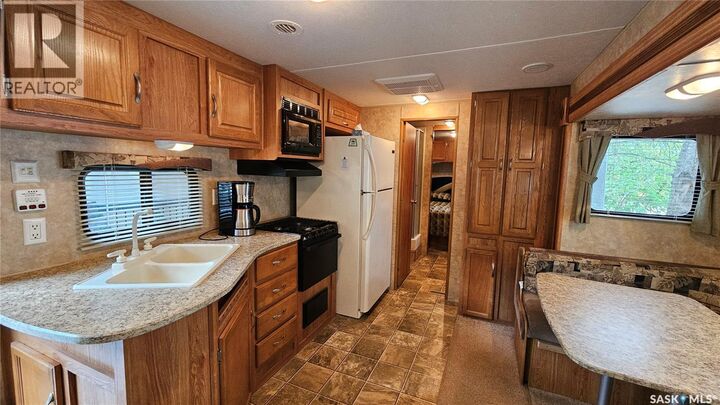 Property Photo:  16 Poplar Beach Resort Village  SK S0K 4P0 