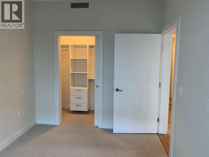 Property Photo:  5311 Alderbridge Way 2xx  BC V6X 0M3 