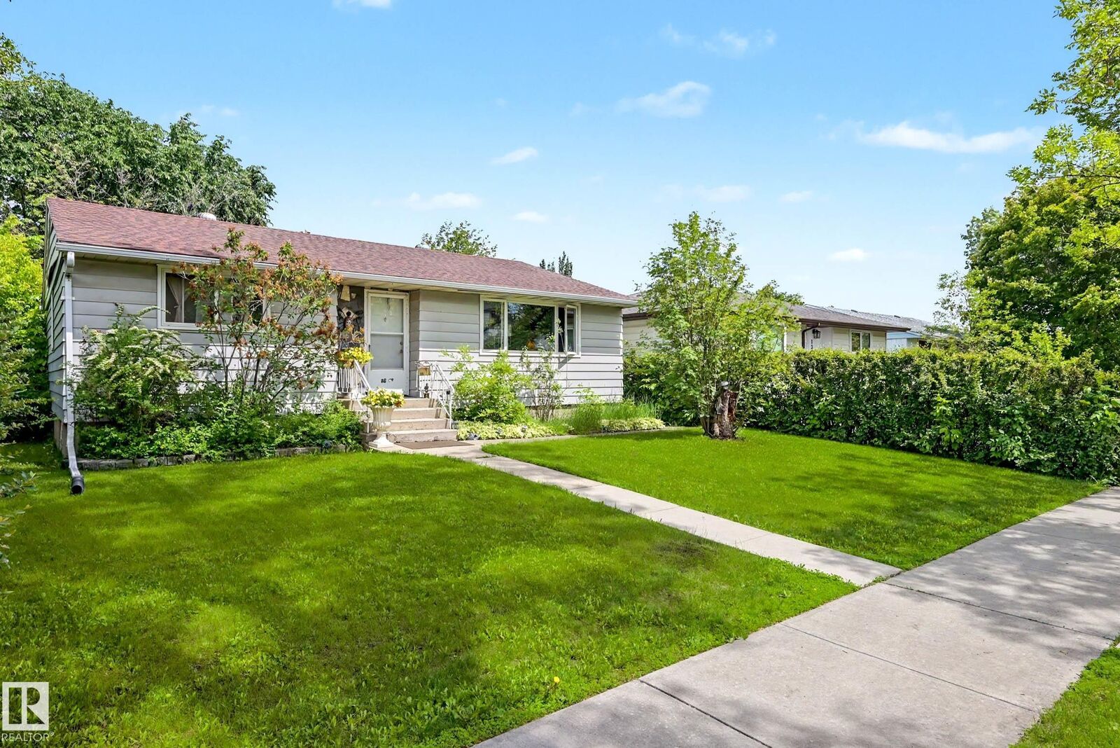 Property Photo: 13636 122 Ave. NW AB T5L 2V8
