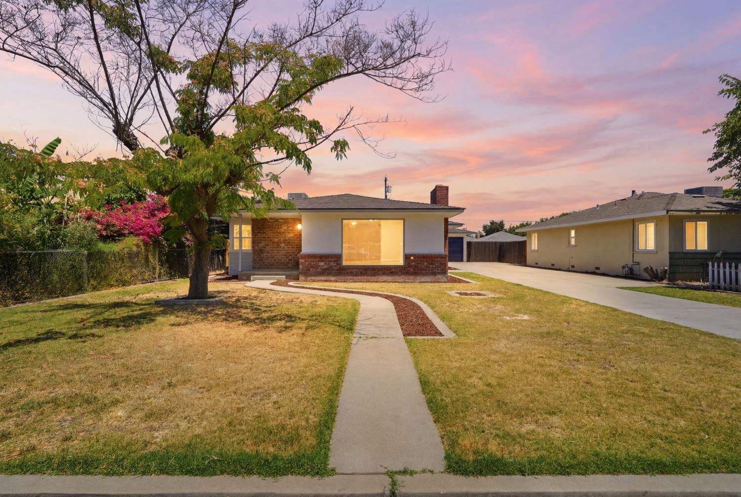 Property Photo:  2114 Palm Avenue  CA 93657 
