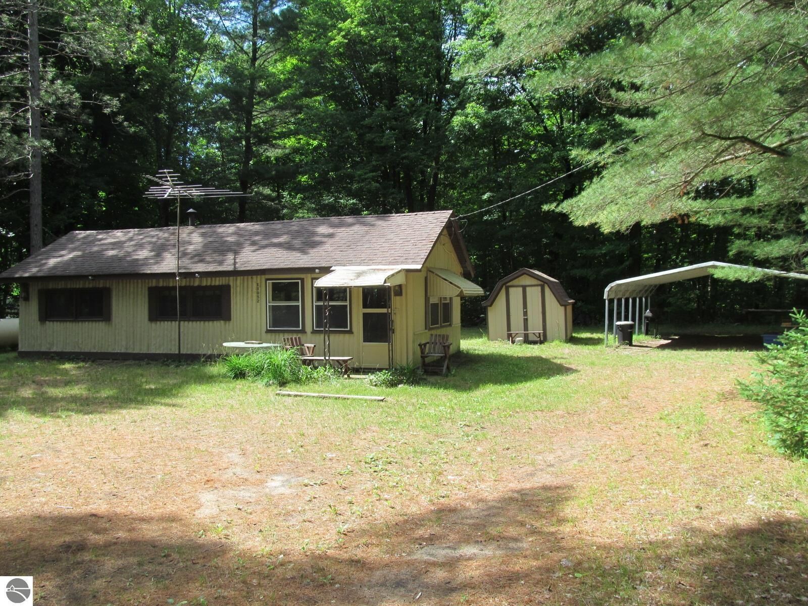 Property Photo:  11052 N Hodenpyle Dam Road  MI 49668 