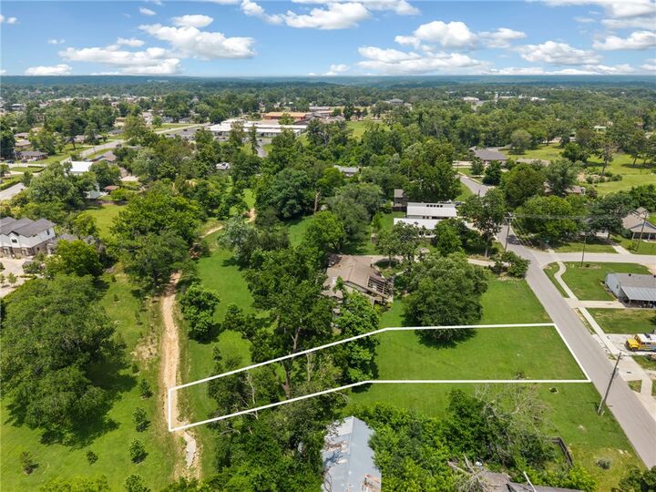 Property Photo:  L7 Phillips Sub NW D Street  AR 72712 