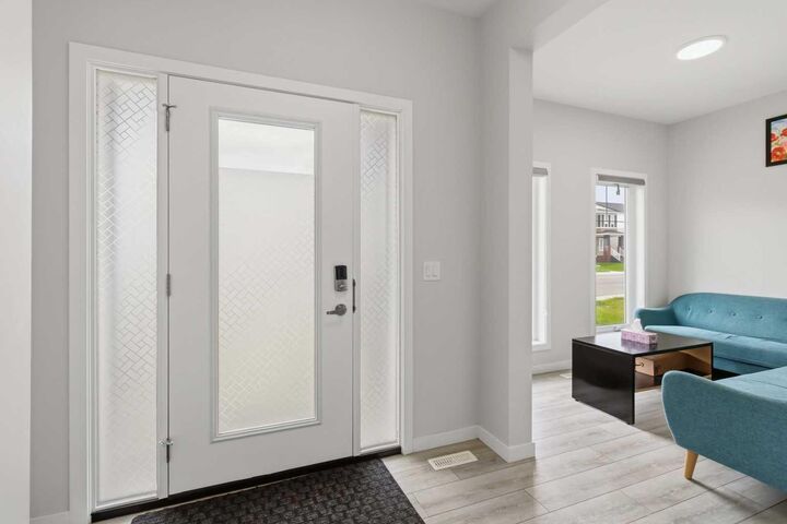 Property Photo: 3223 Chinook Winds Drive SW AB T4B 5S8