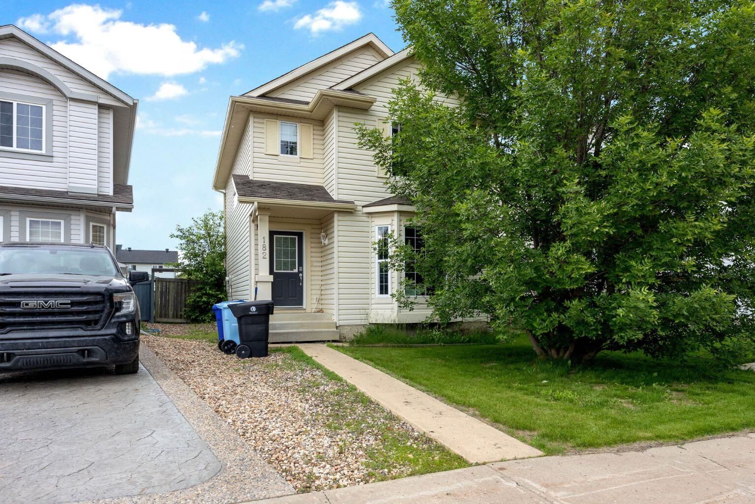Property Photo: 182 McDougall Crescent AB T9K 2P7