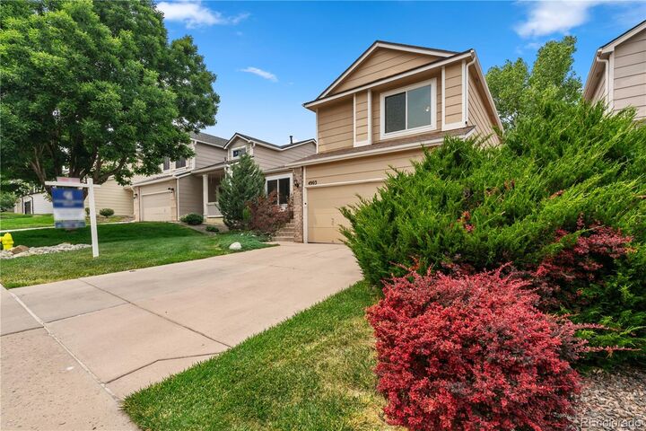 Property Photo:  4903 Apollo Bay Drive  CO 80130 