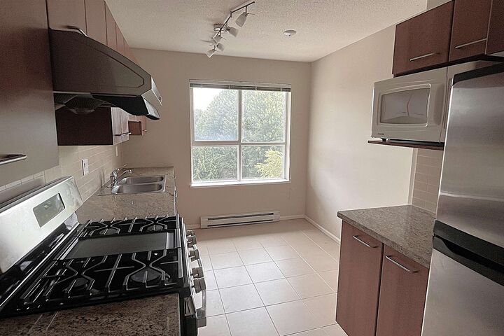 Property Photo: 9200 Ferndale Road 407 BC V6Y 4L2