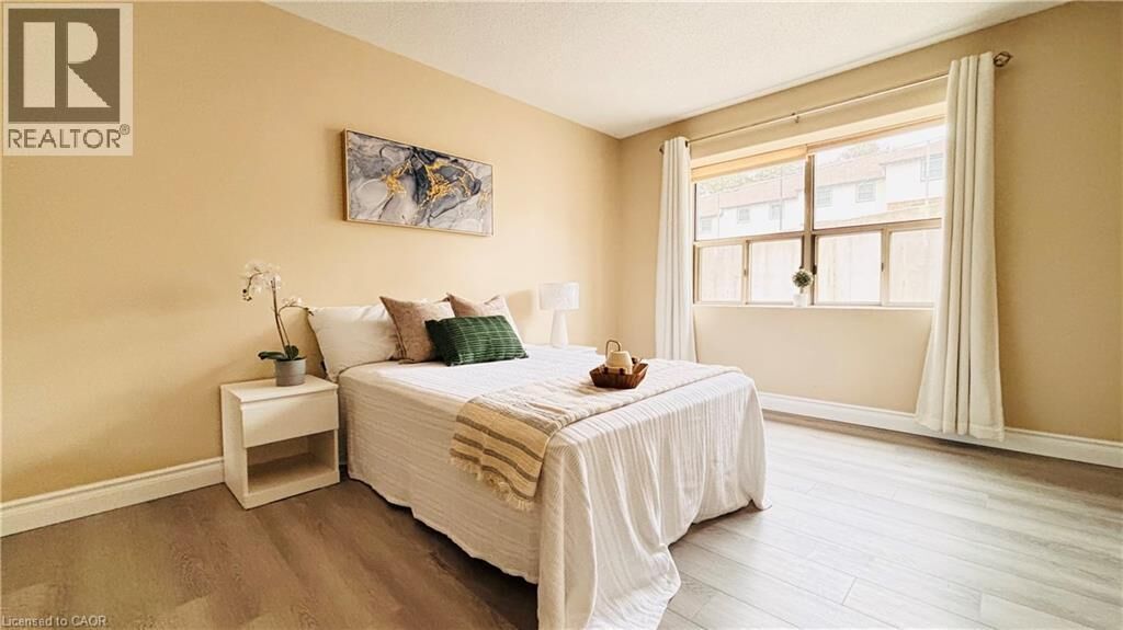 Property Photo:  300 Keats Way 207  ON N2L 6E6 