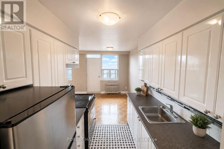 Property Photo:  108 Goodwood Park 330  ON M4C 5S9 