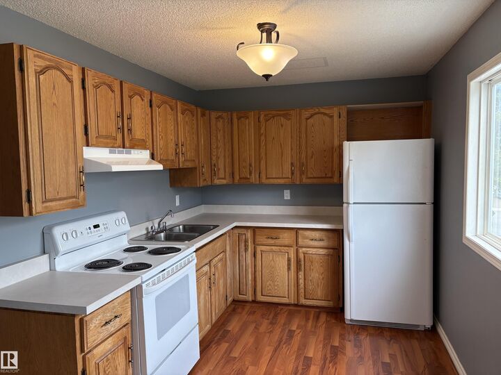 Property Photo: 14644 52 Street NW AB T5A 3M7