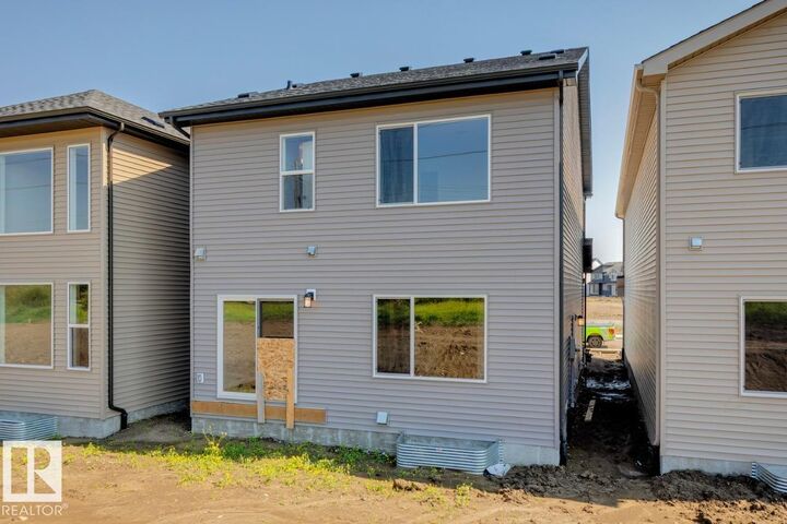 Property Photo: 17328 5 Street NW AB T5Y 6G4
