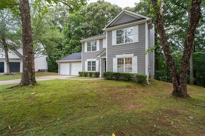Property Photo:  7107 Springchase Way  GA 30168 