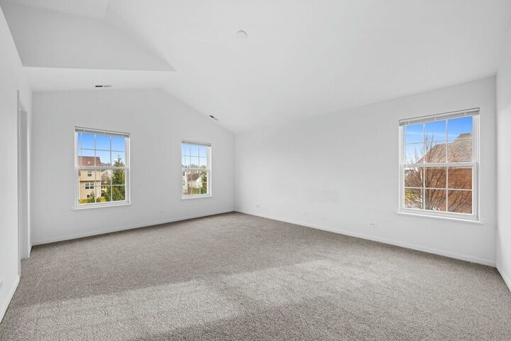 Vaulted primary bedroom