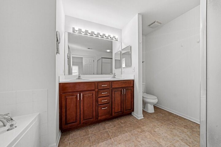 Primary bath with dual vanity